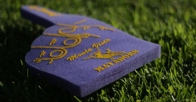 Bull Spirit Commission is selling school-spirited packages in order encourage students to attend the Sept. 9 football game. The ten-dollar package includes a foam finger, a Bull Spirit t-shirt, a meal, and entrance to the game. Photo illustration by Kevin Tsukii.